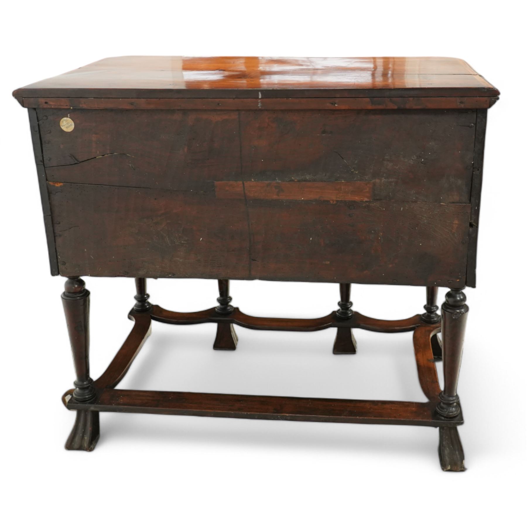 William and Mary design 18th century walnut and yew wood dresser or console table, rectangular canted top with feather banding and moulded edge, over two long and three short cock-beaded drawers, flanked by chamfered uprights above a shaped and cock-beaded apron, raised on six turned and tapering supports united by a shaped box stretcher, on lobed feet 