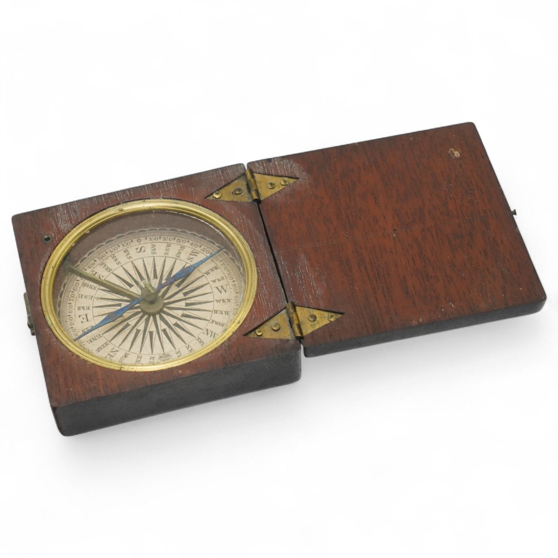 19th Century-magnetic navigational sailors compass in a square mahogany case with a hinged lid and a fully defined paper compass rose register displaying the four cardinal points and 32 quarter wind points, with a magnetic needle and brass recording hand.  