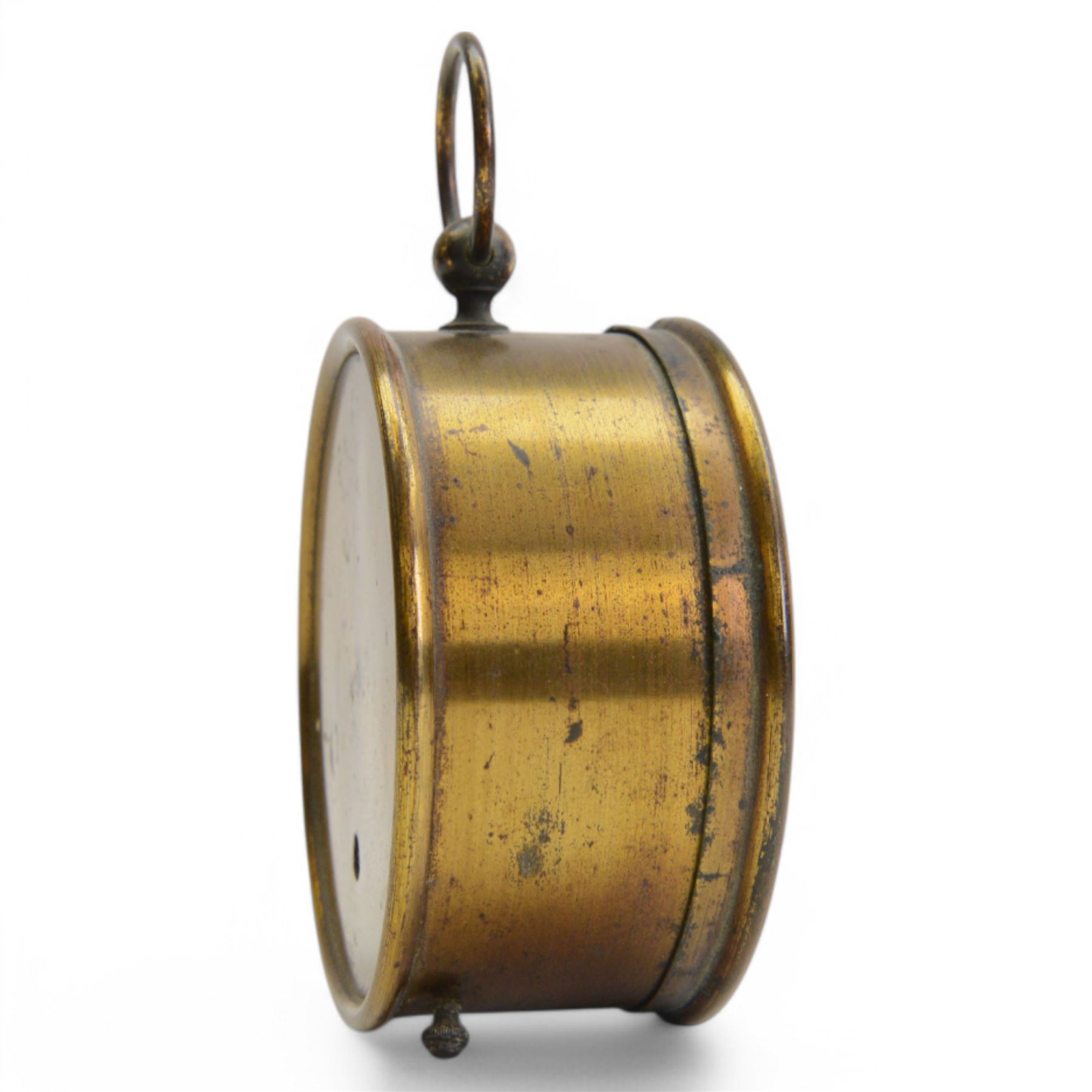 French- late 19th century desktop aneroid barometer in a circular gilt metal case with carrying ring, 3.5 inch paper printed register with predictions and barometric air pressure, with a steel indicating hand and brass recording hand, adjustment screw to the rear.