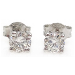  Pair of 18ct white gold, round brilliant cut diamond stud ear-rings, stamped 750, diamonds 0.64ct   