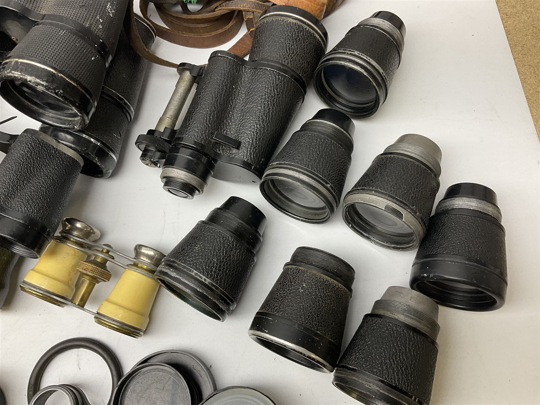 Quantity of binoculars for spares and repair, to include Cogswell & Harrison Primic 8x30, Prinz 8x30, Telstar 35x60, Zeiss Wetzland 8x40 etc