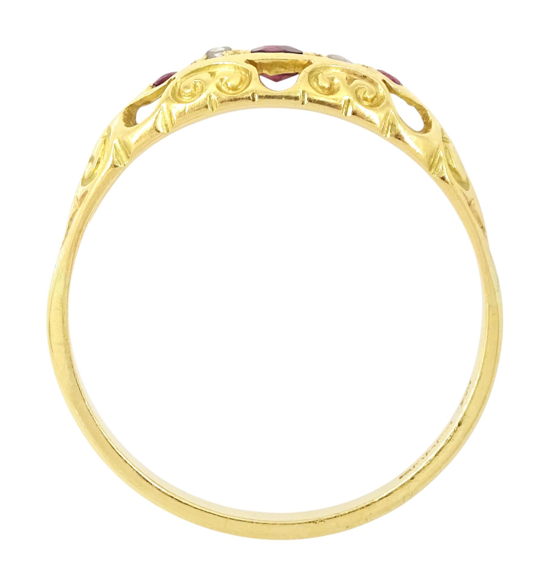 18ct gold ruby and diamond ring, five alternate round cut rubies and rose cut diamonds, in a scroll design setting, Sheffield 2004