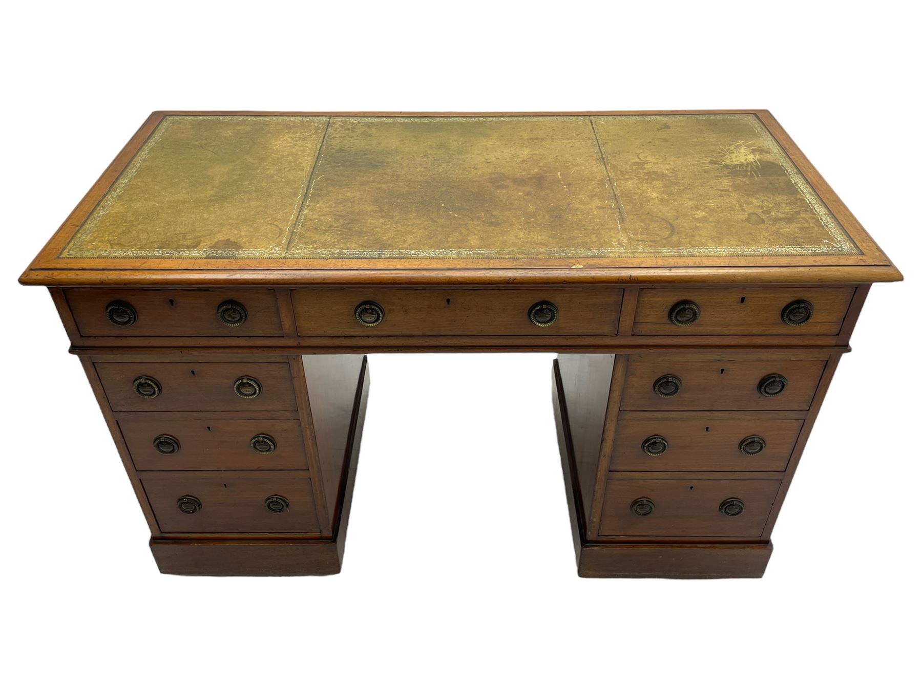 Howard & Sons. - 19th century walnut twin pedestal desk, moulded rectangular top with tooled leather inset, fitted with nine drawers with circular pressed brass handle plates decorated with urns, each drawer fitted with a 'Hobbs, London' lock, on plinth base, the upper right-hand drawer stamped 'Howard & Sons, Berners St.' and with paper label