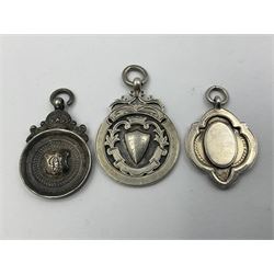 Ten early 20th century silver cartouche fobs, to include a Yorkshire Rose example, all hallmarked with various dates and makers

