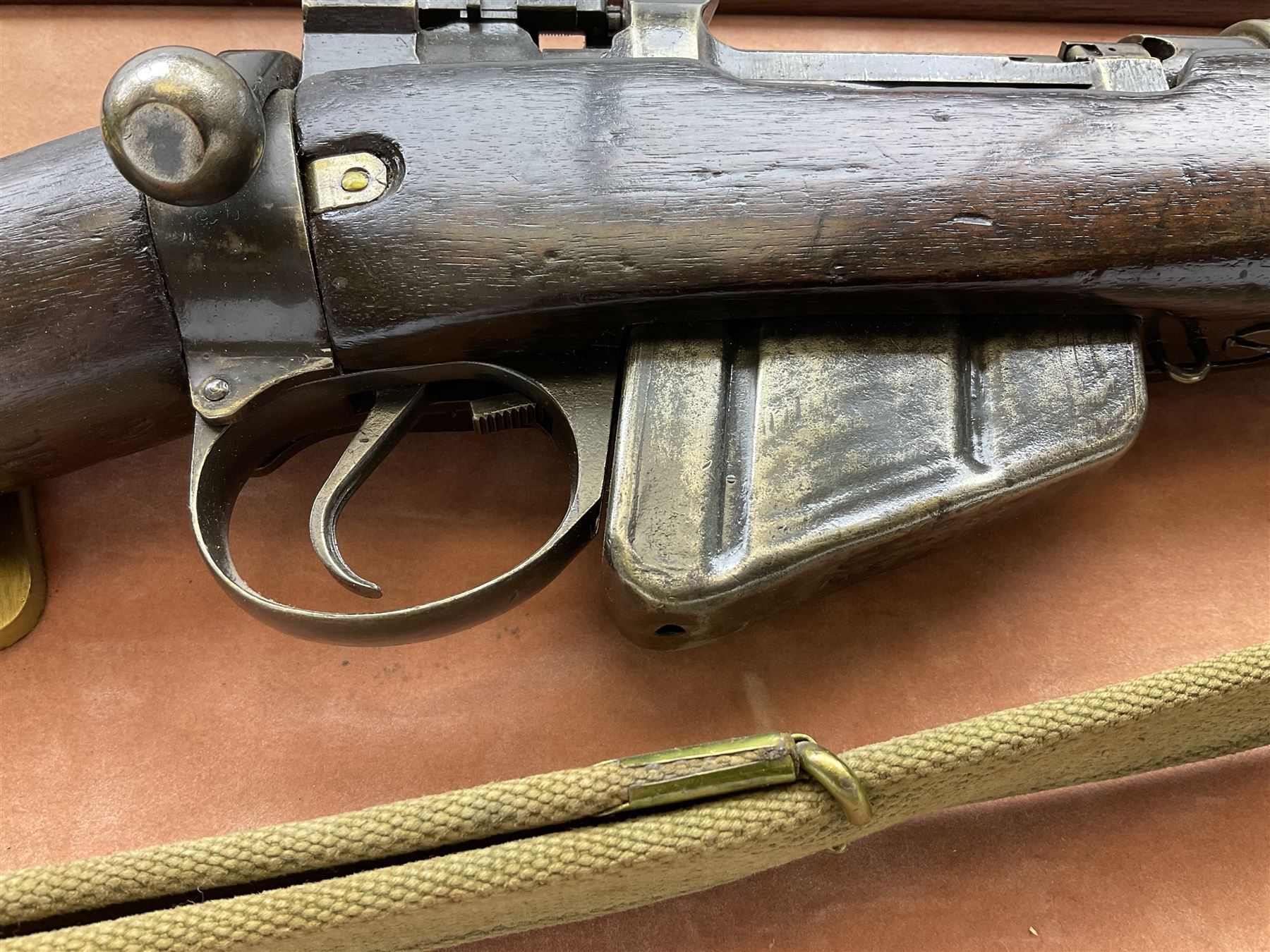 WW2 Lee Enfield No.4 Mk.1 .303 bolt-action rifle with hinged butt compartment, made by SA Ltd., Long Branch, Canada 1942, serial no.5L0646 L113cm; mounted on a framed display board with No.4 Mk.II spike bayonet, No.9 Mk.1 blade bayonet, two inert 5-round clips and brass biographical plaque by Antler Military Originals detailing DA Cert No.C3444 OLD STYLE DEACTIVATION SO FIREARMS CERTIFICATE REQUIRED OR RFD