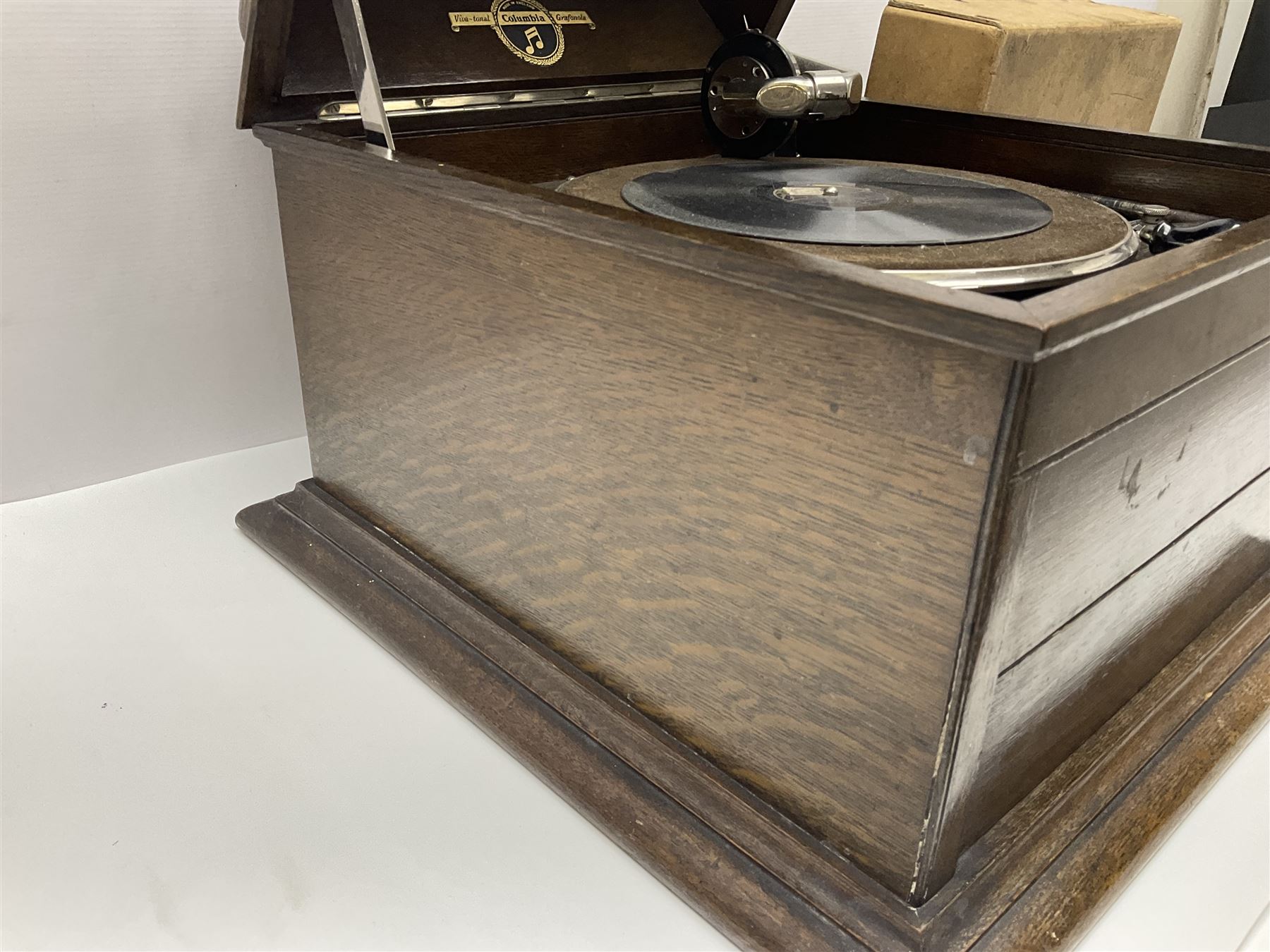 Columbia Grafonola tabletop hornless gramophone, with detachable winding handle, together with a collection of records 