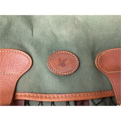 Miscellaneous shooting accessories - W.J. Bowman & Sons clay pigeon launcher; two leather cartridge belts; three cartridge bags; two canvas/leather game bags; and two metal/wooden cartridge boxes