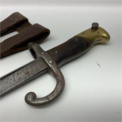 French Model 1892 Mannlicher Berthier bayonet with 39.5cm fullered blade; in metal scabbard with leather frog L54cm overall; and French Model 1874 epee bayonet (no scabbard) (2)