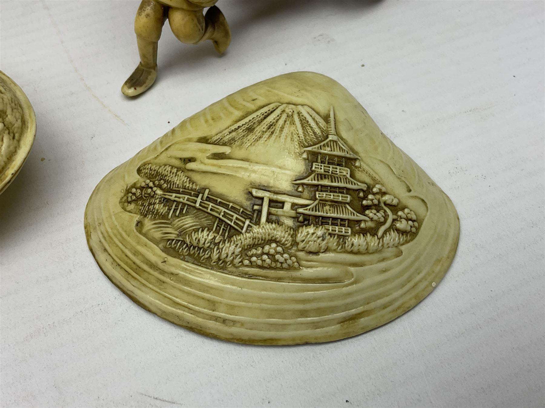 Collection of Japanese celluloid figures, including Rickshaw groups, fishing scene, oxen etc 