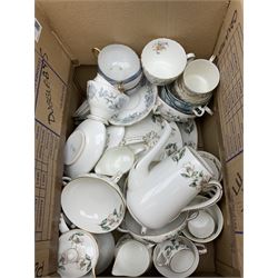 Collection of tea and dinner wares, including an extensive set of 'Christmas Rose' Crown Staffordshire, including tea and coffee wares and two lidded tureens, a blue and white decorated set of cups and saucers, cake stand etc, three boxes . 