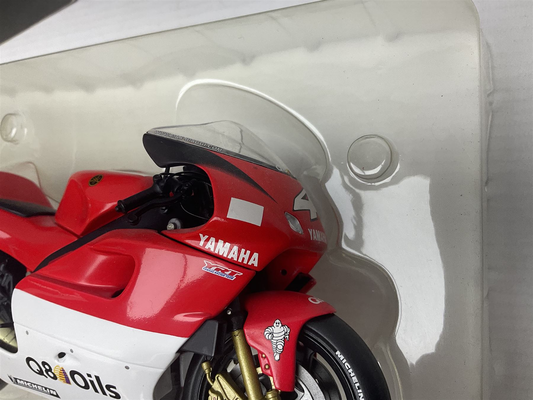 Three Minichamps 1:12 scale die-cast motorcycles - Yamaha YZR 500 Max Biaggi 2000; Yamaha YZR-M1 Colin Edwards Fiat Yamaha Team MotoGP 2007 GP Australia; and Yamaha YZR 500Team Yamaha Max Biaggi 500ccGP 2001; all boxed (3)