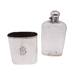 Edwardian silver mounted glass hip flask, the glass body of typical form, with rounded and cut glass shoulders, silver mounted collar and hinged domed cover with engraved monogram to top and cork to interior, and removable silver sleeve with conforming monogram to centre and gilt interior, hallmarked Mappin & Webb Ltd, Birmingham 1905, overall H16cm, silver sleeve H9.5cm, silver sleeve approximate weight 4.24 ozt (131.9 grams)