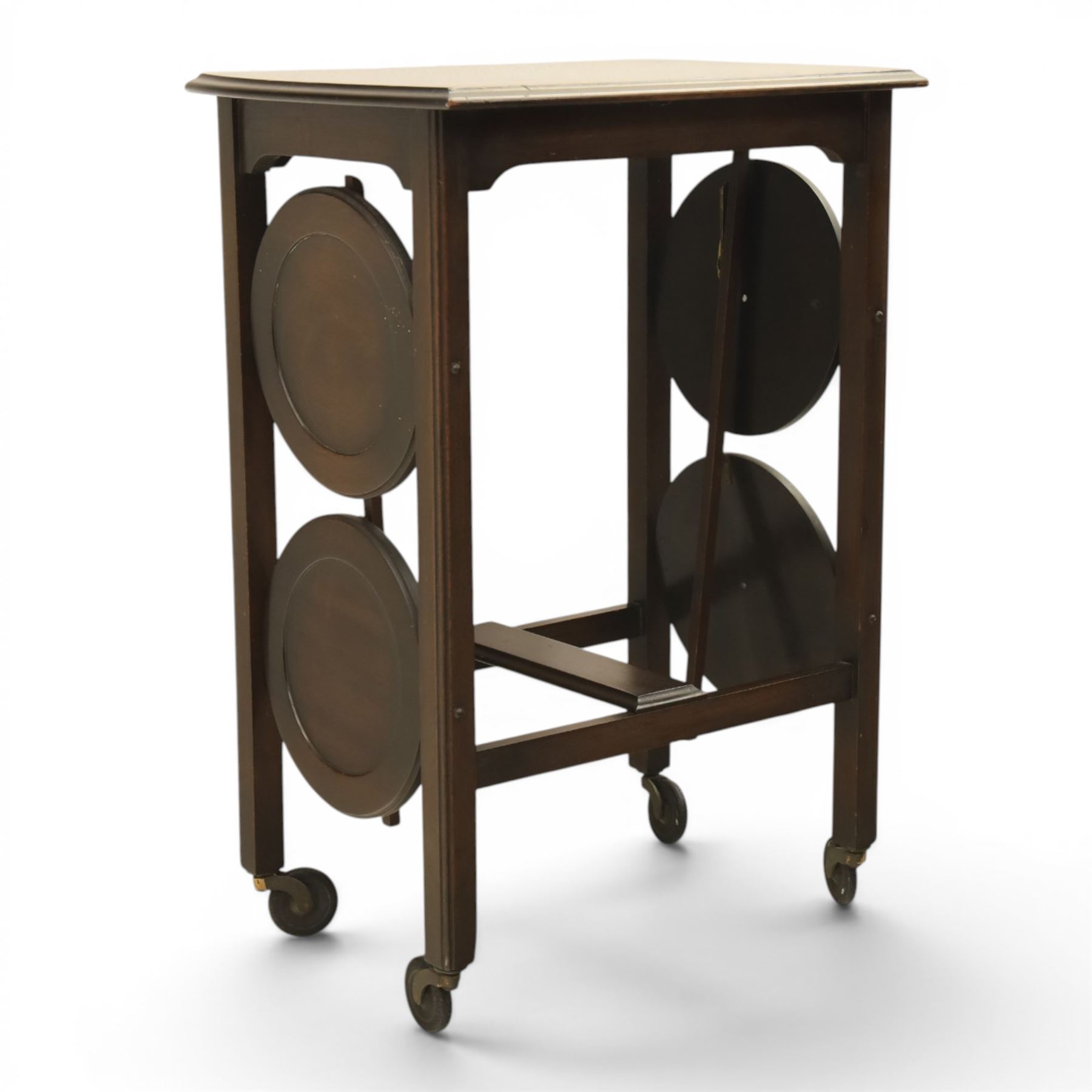 Early 20th century side table with double cake stand, rectangular moulded top, cake stands either side with support, raised on square legs terminating in castors