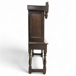 19th century and later carved oak court cupboard, the upper section with two drawers above a central cupboard door flanked by panels, lower section with single long drawer, on turned supports united by carved stretchers