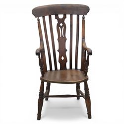 Traditional design elm farmhouse chair, a vase splat flanked by turned spindles, on turned supports united by a H stretcher