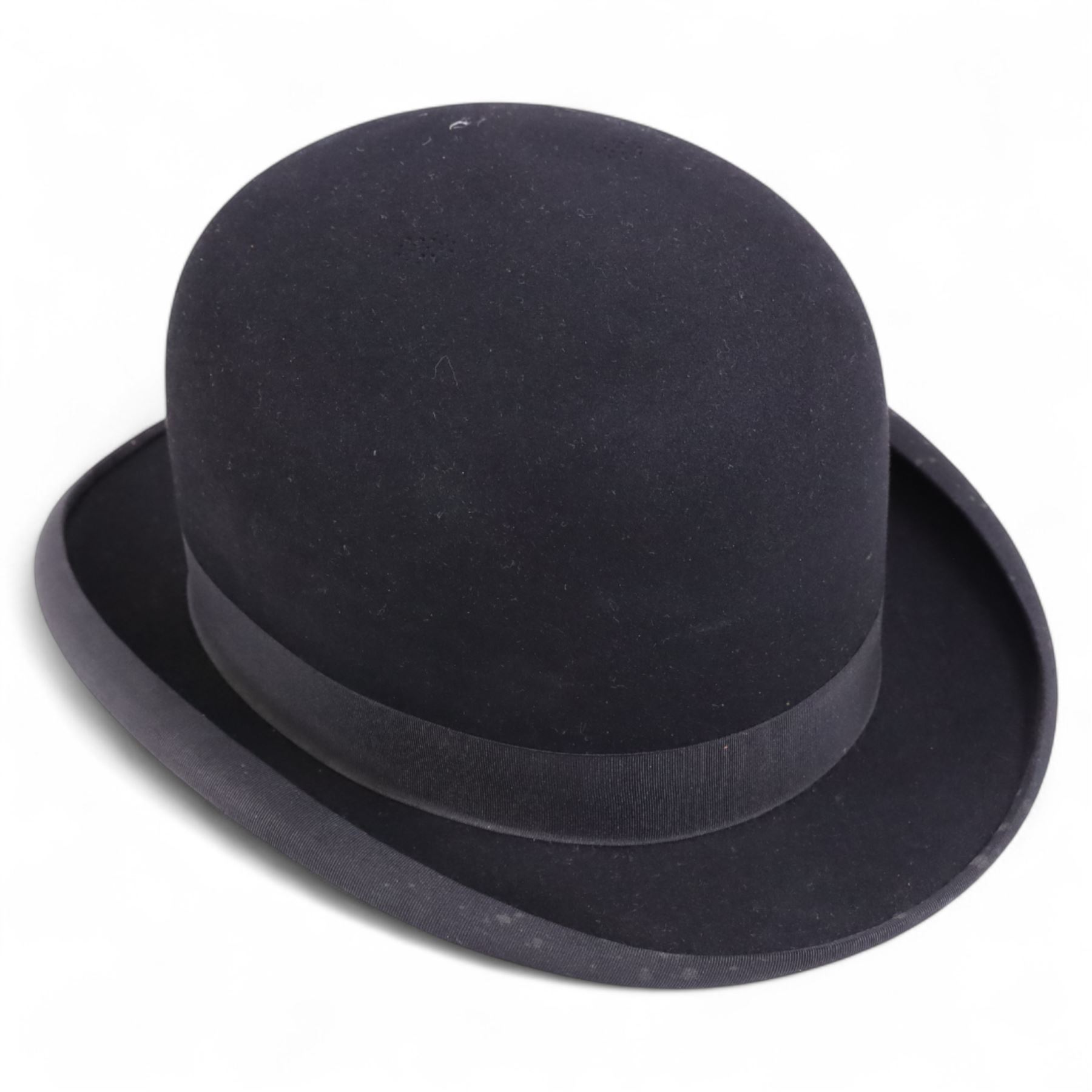 Scott & Co top hat, together with  bowler hat, two shooting sticks, WWII rubber long coat, two riding show jackets and other collectable items 