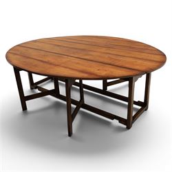 Large 18th century style oak wake table, with drop leaves and gateleg action on turned supports extends to 178 cm 