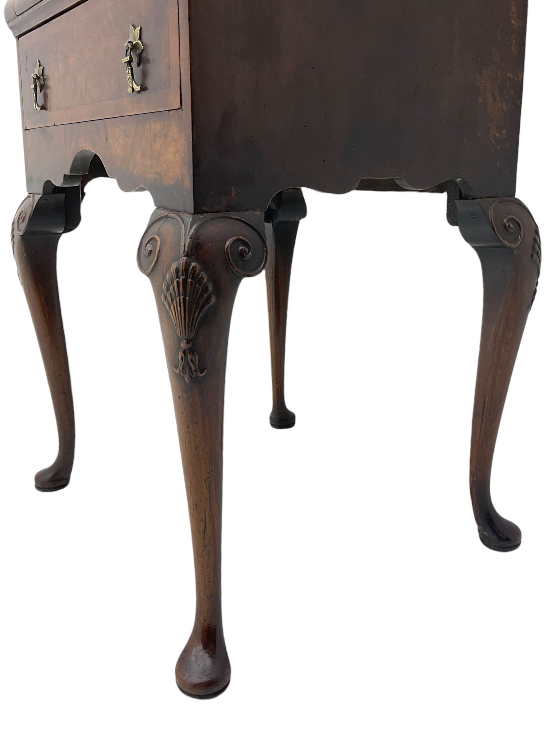 Small early 20th century Queen Anne style bookcase on bureau secretaire, the moulded arched pediment over mirrored door in shaped frame, the bureau fitted with fall front enclosing curved fitted interior, cushion moulded drawer over single drawer, on scroll and shell carved cabriole supports