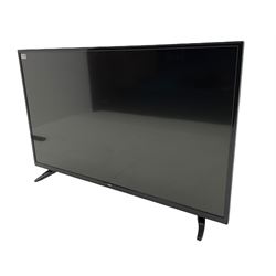 BUSH TV DLED49287FHD 49'' television with remote and a PAIYDA FS22C-2.0
