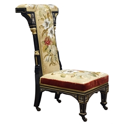  Late Victorian Aesthetic Movement Prie-dieu Chair, of Puginesque design, ebonised frame with gilt detail, upholstered in floral needle and bead work, H98cm  