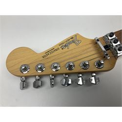 Mexican Fender Stratocaster electric guitar in black c2003 with Floyd Rose tremolo system, serial no.MZ3129600; L98cm; in Freestyle fitted case with 2006 Diamond Anniversary booklet
