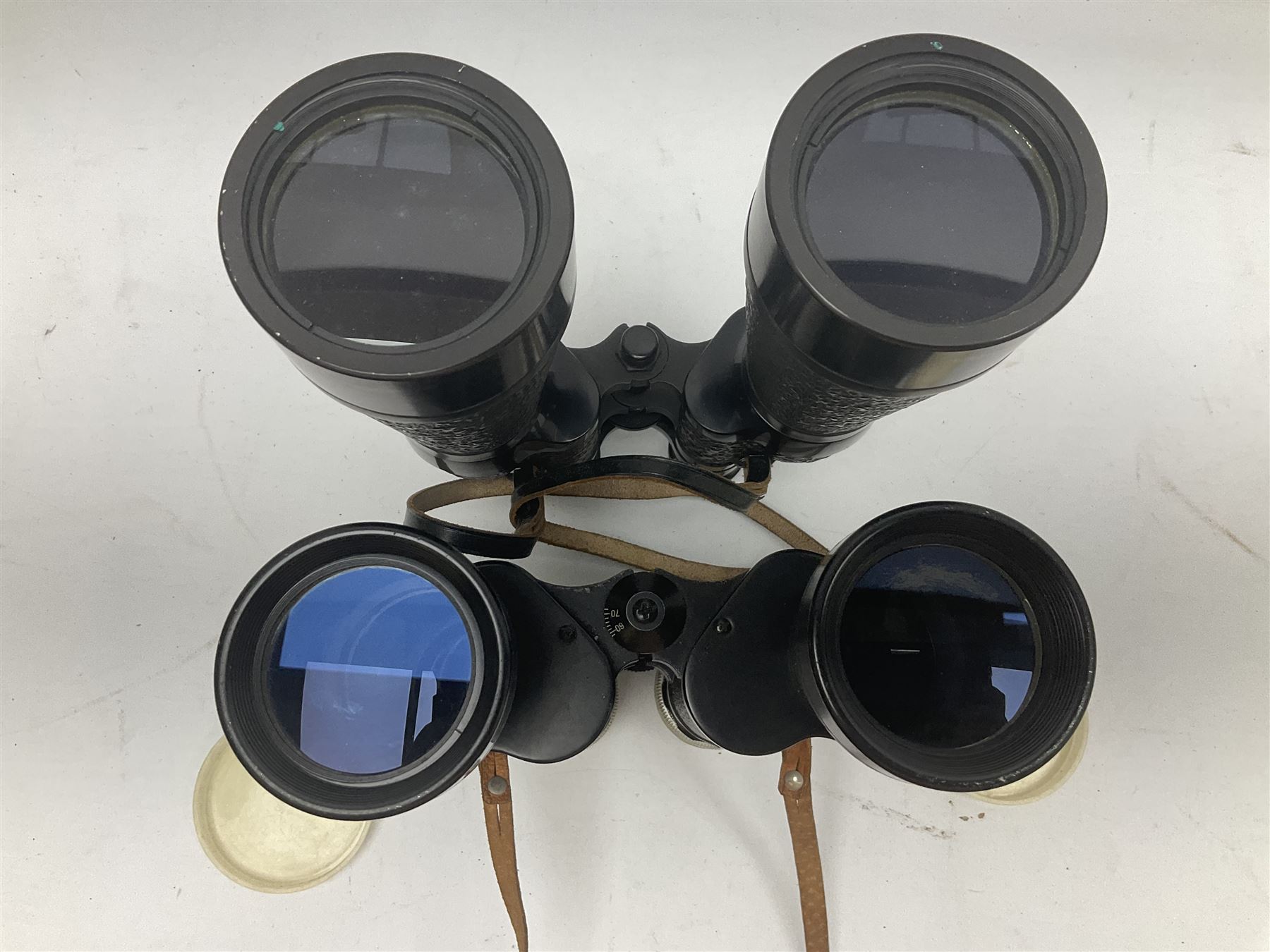 Ten cased pairs of binoculars, to include Ross London Steplux 7x50, Ross Solaross 16x60, Crescent zoom 7x- 12x50, Hilkinson 20x60,  Ross Stepnada 7x30,  Philo 10x50 etc
