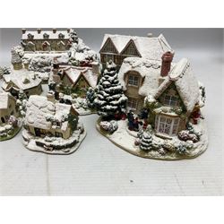 Five Lilliput Lane Illuminated Cottages, comprising Christmas is Coming, with box and deed, Christmas at Mol's, with box and deed, Christmas in Canterbury, with box and deed, Christmas Lights at Sweet Delights and The Three Kings, with box and deeds, together with twelve other Lilliput lanes, to include The First Noel, with box and deed, Winters Moonlight, Yuletide treats, with box and deed etc (17)