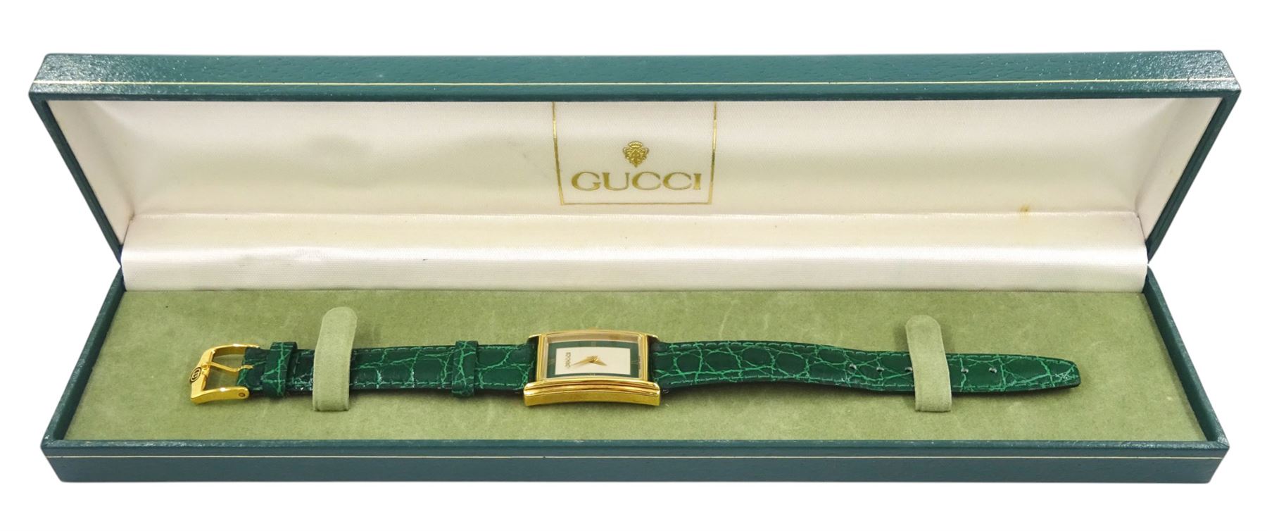 Gucci ladies gold-plated quartz wristwatch, Ref. 2600 L, silvered and green dial, on original green leather strap with gilt buckle, boxed