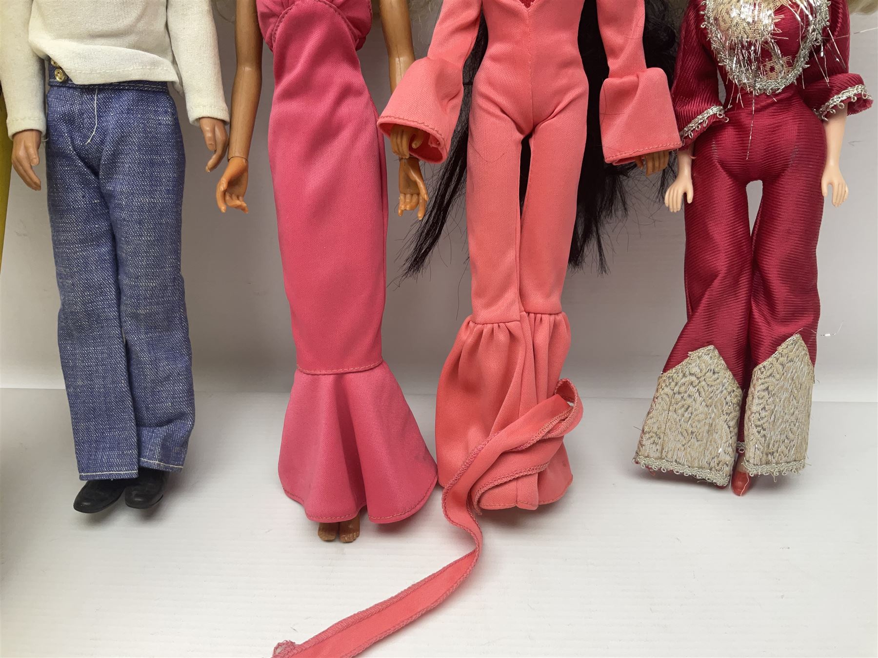 Pelham Puppet - Tyrolean Girl in yellow box; three 'A' Team action figures; clockwork plastic Mickey Mouse figure; and seven various fashion dolls (12)