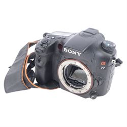 Sony Alpha A77 digital SLT camera body serial no. 0715628, with a Sony DT 2.8/16-50 SSM lens, serial no. 1810590, boxed with soft shell carry case, charger and instructions