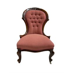 Victorian walnut framed nursing chair, arched cresting rail carved with foliage cartouche, upholstered in buttoned fabric, on cabriole front supports