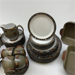 A Denby Marrakesh pattern dinner service, comprising six dinner plates, six dessert plates, seven side plates, two serving dishes, six bowls. six tea cups, six saucers, six coffee mugs, milk jug and saucer.
