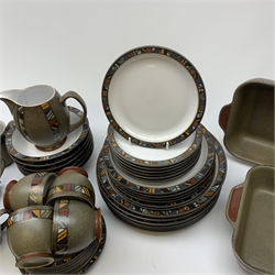 A Denby Marrakesh pattern dinner service, comprising six dinner plates, six dessert plates, seven side plates, two serving dishes, six bowls. six tea cups, six saucers, six coffee mugs, milk jug and saucer.
