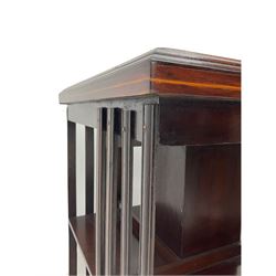 20th century mahogany revolving bookcase, inlaid centre motif, satinwood banded border