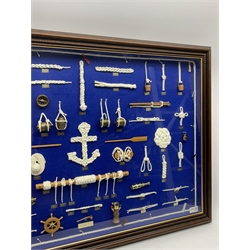  Large framed knot board, including miniature Binnacle, ships wheel and sextant, by Captain D.J.Walker August 2007, W90cm, H60cm,  Provenance:  Captain Walker was captain of the North Sea Ferry Norland which was later requisitioned by the MOD to be used as a Troopship to be sent to the Falkland Islands  