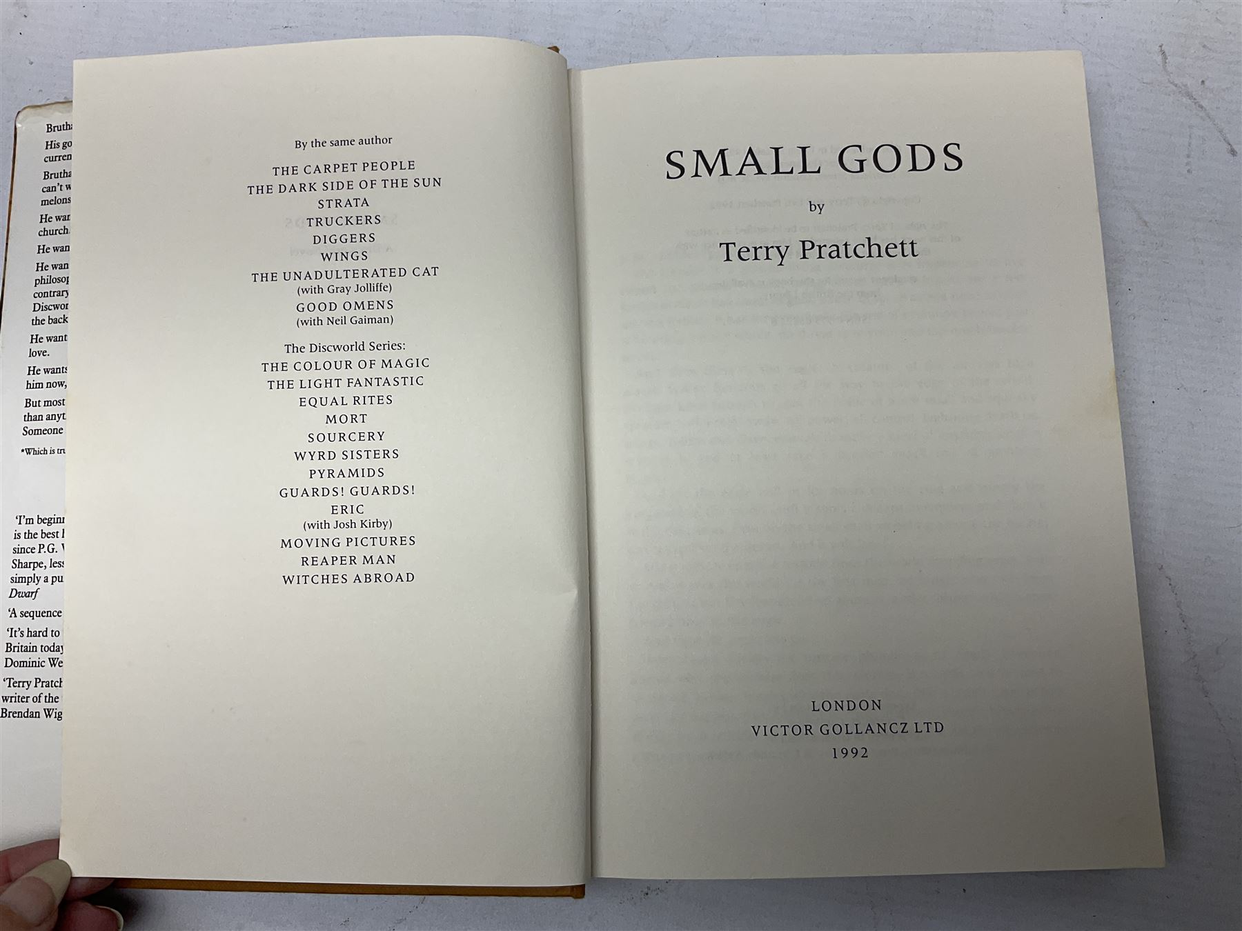 Collection of twenty-three hardback Terry Pratchett books, comprising approximately eighteen first editions including The Fifth Elephant signed & inscribed by Pratchett, all with dustjackets