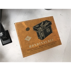 Large quantity of photo developing, dark room and photography equipment - quantity of Fogro 2'' x 2'' slide frames, PHILIPS movielight PSG125, Paterson 2 print forceps, atlas photo flash M3 clear, two Paterson 35mm developing tanks, Ilford photography paper 12'' x 16''and 8'' x 10'', Fujifilm photography paper 8'' x 10'' and 12'' x 16'', Rondinax 35U developing tank boxed, Simma Roller, two Ilford processing drums 30x40cm and 20x25cm, two other processing drums, Paterson 35mm contact proof printer, S&K 60D-C colour analyser etc... in three boxes