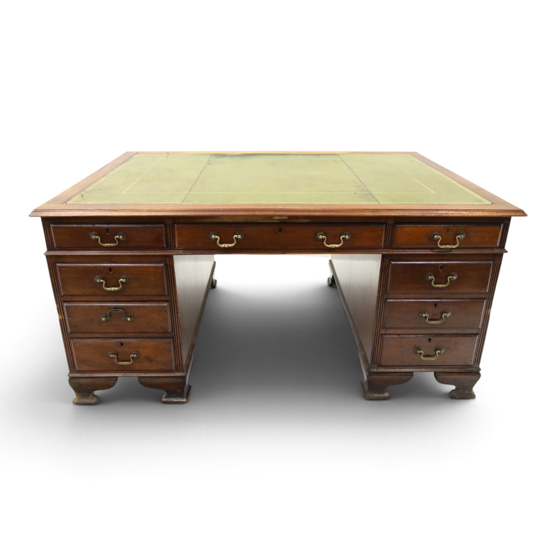 D Matthews & Son Office Furnishers (Liverpool) - Edwardian mahogany twin pedestal partners desk, rectangular top with inset green leather writing surface, fitted with an assortment of twelve drawers with brass swan neck handles, the pedestals with cupboards fitted to the opposing side, raised on ogee bracket feet