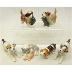  Five Royal Copenhagen dogs from the Mini Collection, Basset Hound 750, two Puppies holding a shoe 744, two Jack Russell's 743 and Dog & Cat group 752 (6)  