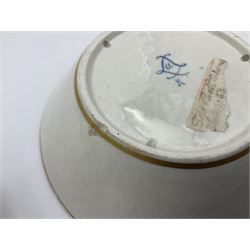 Sèvres soft paste porcelain coffee can and saucer with date code for 1754, painted and gilded with flowers, dangling from the shaped green border, interlaced LL monogram enclosing the date letter A above painters mark for Dodin, coffee can H7cm, saucer D14.5cm