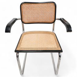 Retailed by Habitat - after Marcel Breuer - set of six 'Cesca' elbow chairs, on chromed supports with cane seat and back, in black paint finish (W62cm, H84cm, D50cm); together with a rectangular extending dining table, sliding top with drop leaf, on chromed supports (194cm x 90cm, H74cm)