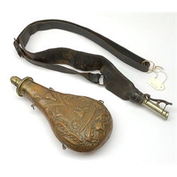 Victorian large copper powder flask embossed with a hunting scene within an oak leaf border with stag and fox heads, the nozzle marked 'Extra Quality Sykes Patent', fitted with four suspension rings H24cm; together with Victorian leather shoulder shot flask with Sykes nozzle L80cm (2)