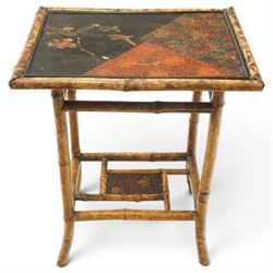 Bamboo and chinoiserie occasional table, rectangular top with geometric print and foliate design, raised on bamboo supports united by an undertier