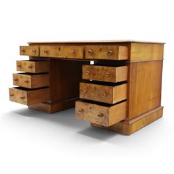 19th century burr walnut twin pedestal desk, rectangular top inset tooled green leather insert with moulded edge, frieze with three drawers with turned wooden pulls, raised on pedestal bases, containing three graduated drawers raised on plinth bases with castors