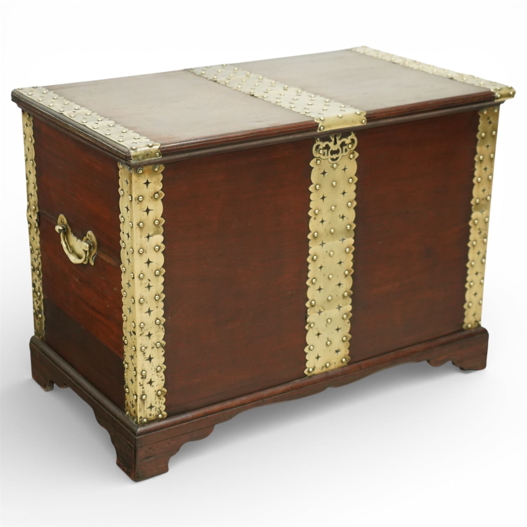 Georgian mahogany brass bound plate chest, the rectangular hinged top mounted with pierced and studded brass straps, fitted with pierced brass escutcheon and large brass handles to the side, lower moulded edge on bracket feet