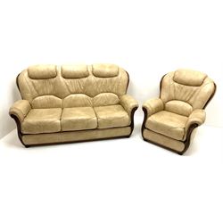 Three seat sofa upholstered in a cream leather (W178cm) and matching armchair (W85cm)