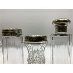 1920's silver stand, hallmarked Birmingham 1922, together with two tall faceted clear glass dressing table jars with hallmarked silver covers, and cut glass vase with hallmarked silver mounted collar, and small group of silver handled accessories, including files, picks, etc., approximate total silver weight 58.8 grams