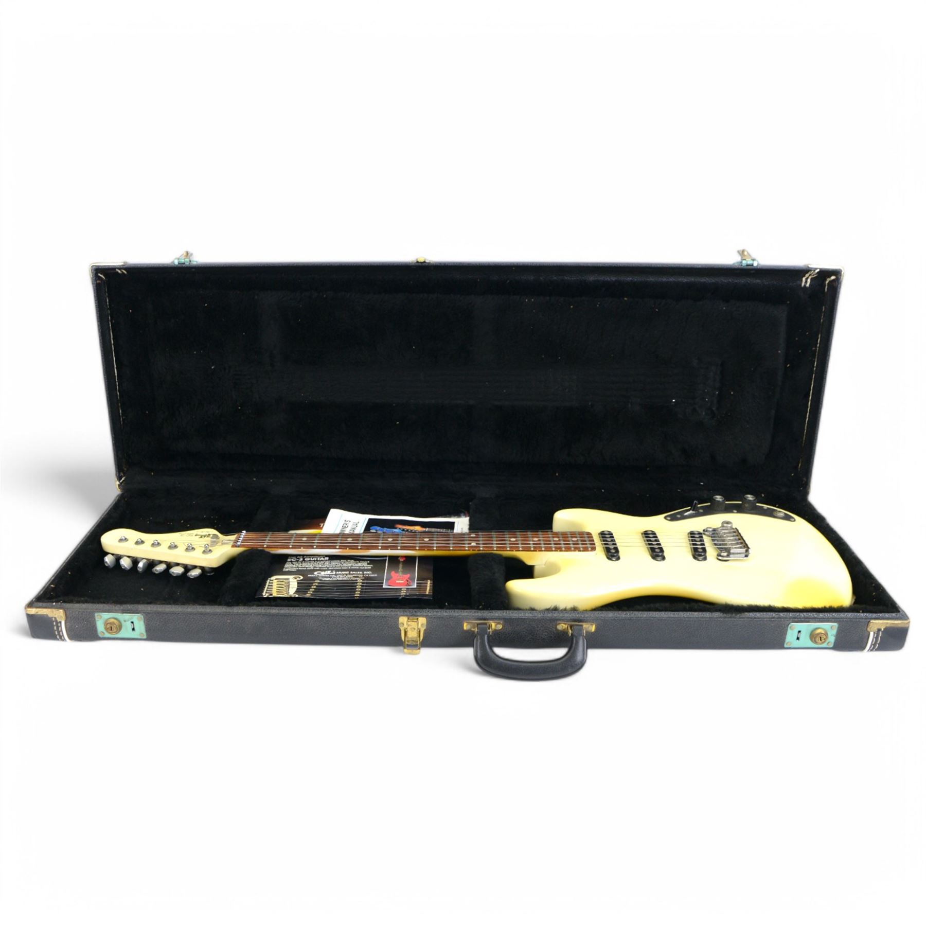 1980s G&L by Leo Fender SC3 electric guitar, in cream finish, made in USA serial no. G021189, contained within a hard carry case