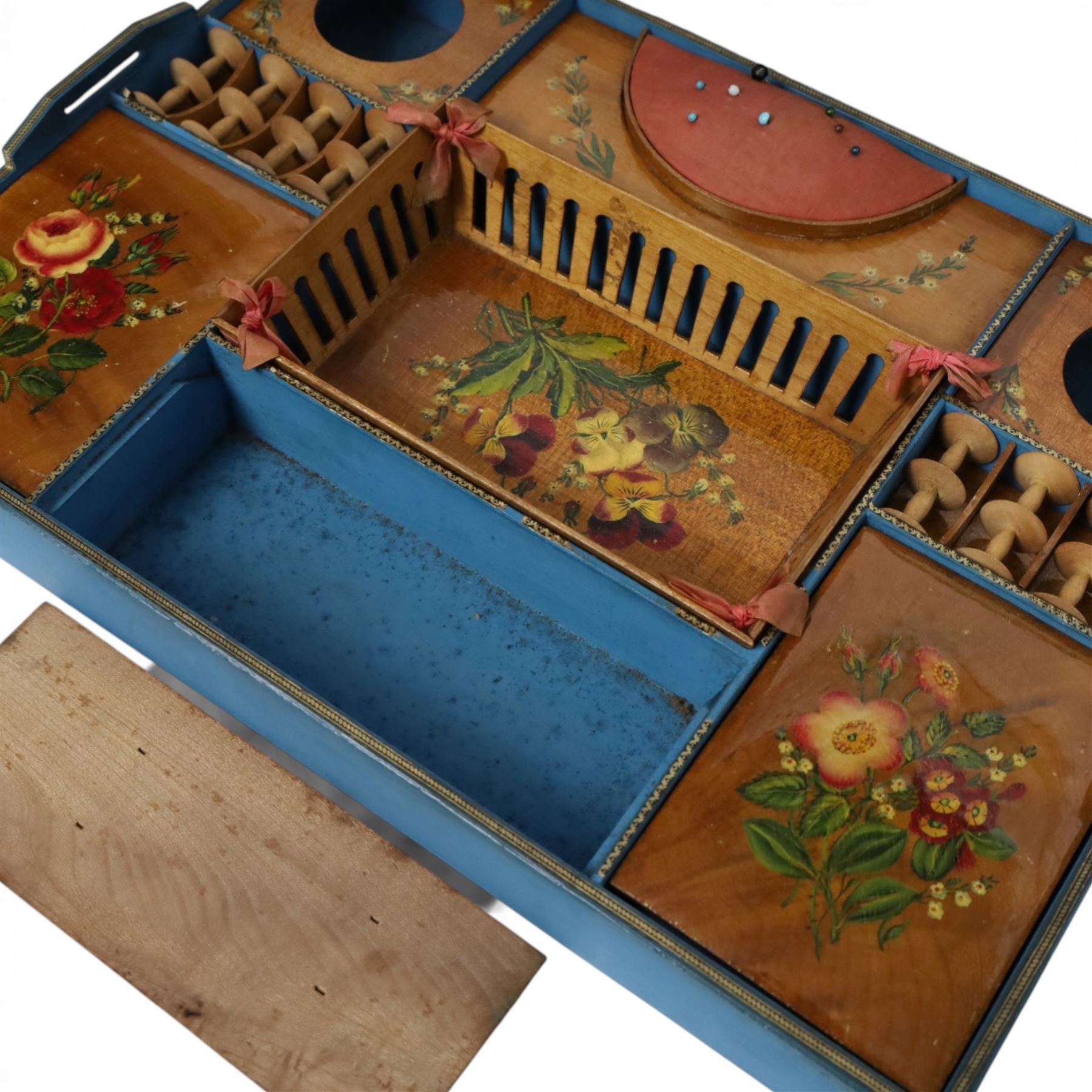 19th century satinwood sewing box, of rectangular form, the hinged cover with foliate decoration opening to reveal a removable compartmented tray with pin cushion, bobbins and removable central basket, painted with violas, upon compressed bun feet, H13cm L39cm D29cm