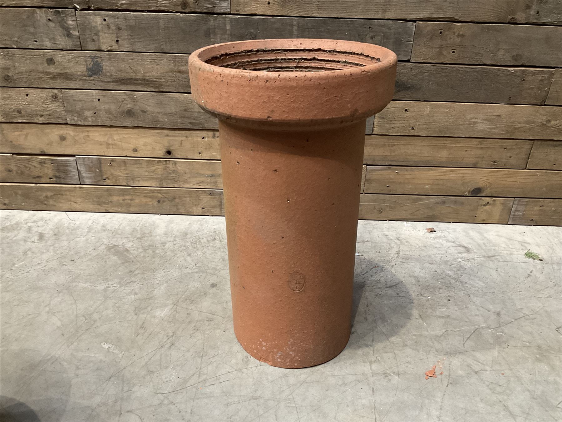Cast iron cauldron set pot with 2 terracotta chimney pots and 2 terracotta planters,